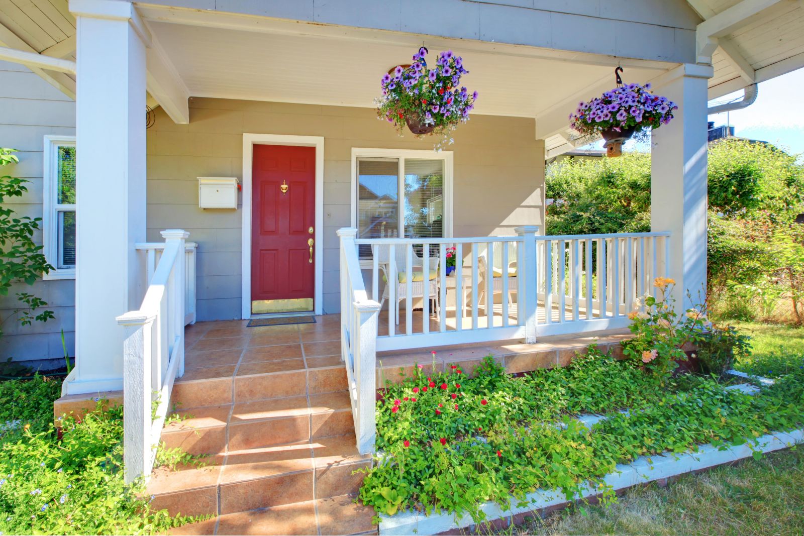 beautiful home with an elegant red front door