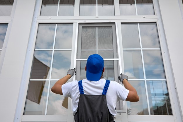 Man installing Marvin windows