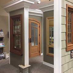 Various windows and doors on display inside Raleigh showroom