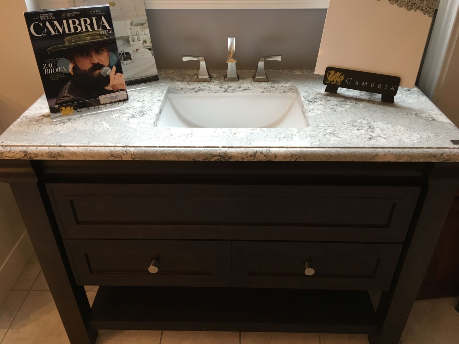 bathroom sink and cabinet display in showroom
