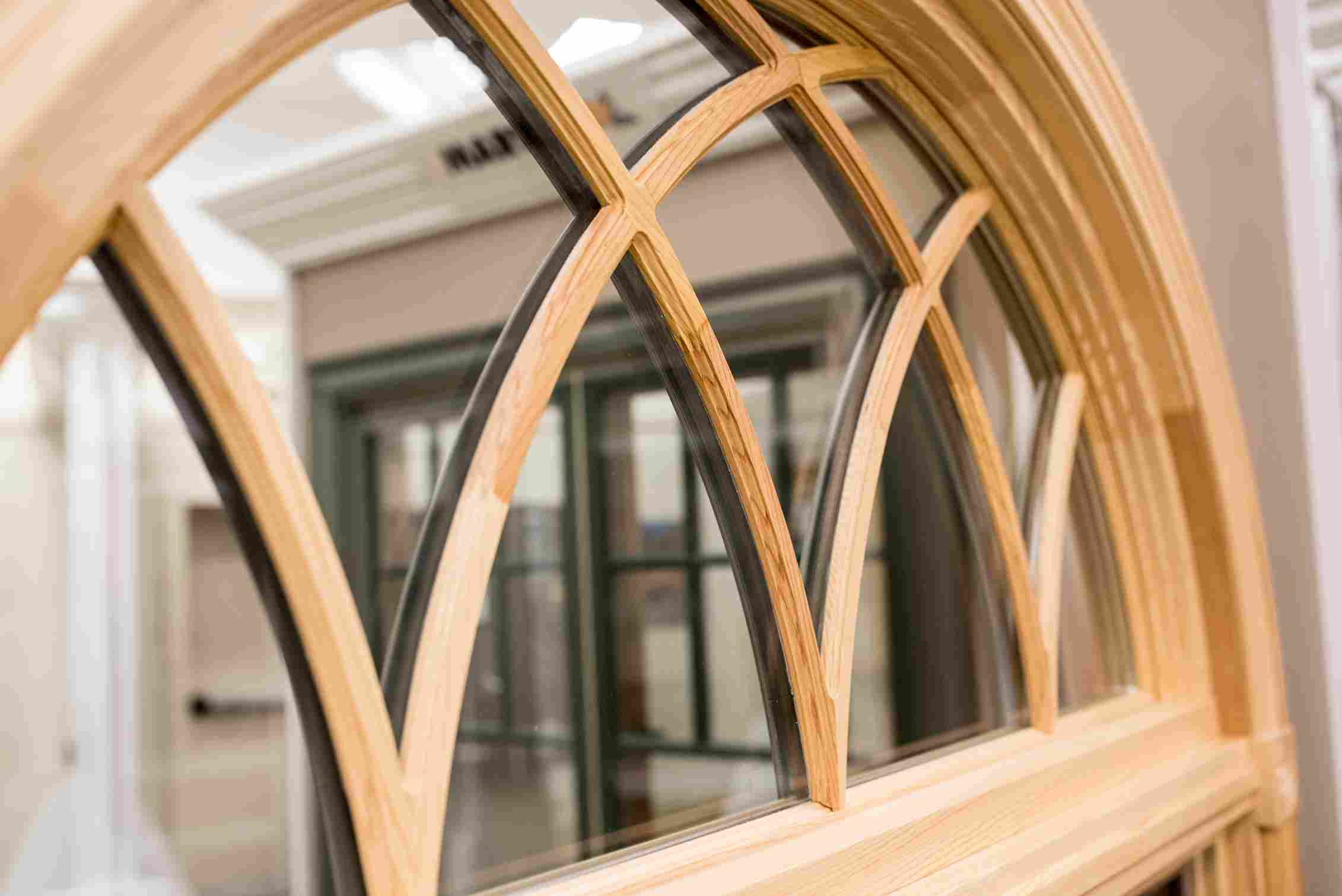 Arched glass window close-up, revealing elegant features, found in Raleigh, NC