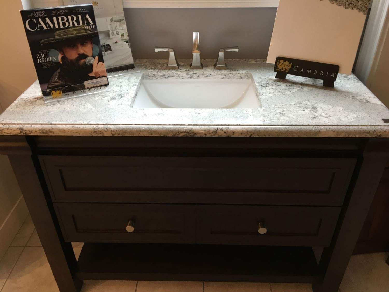 Bathroom vanity with stone countertop and integrated sink