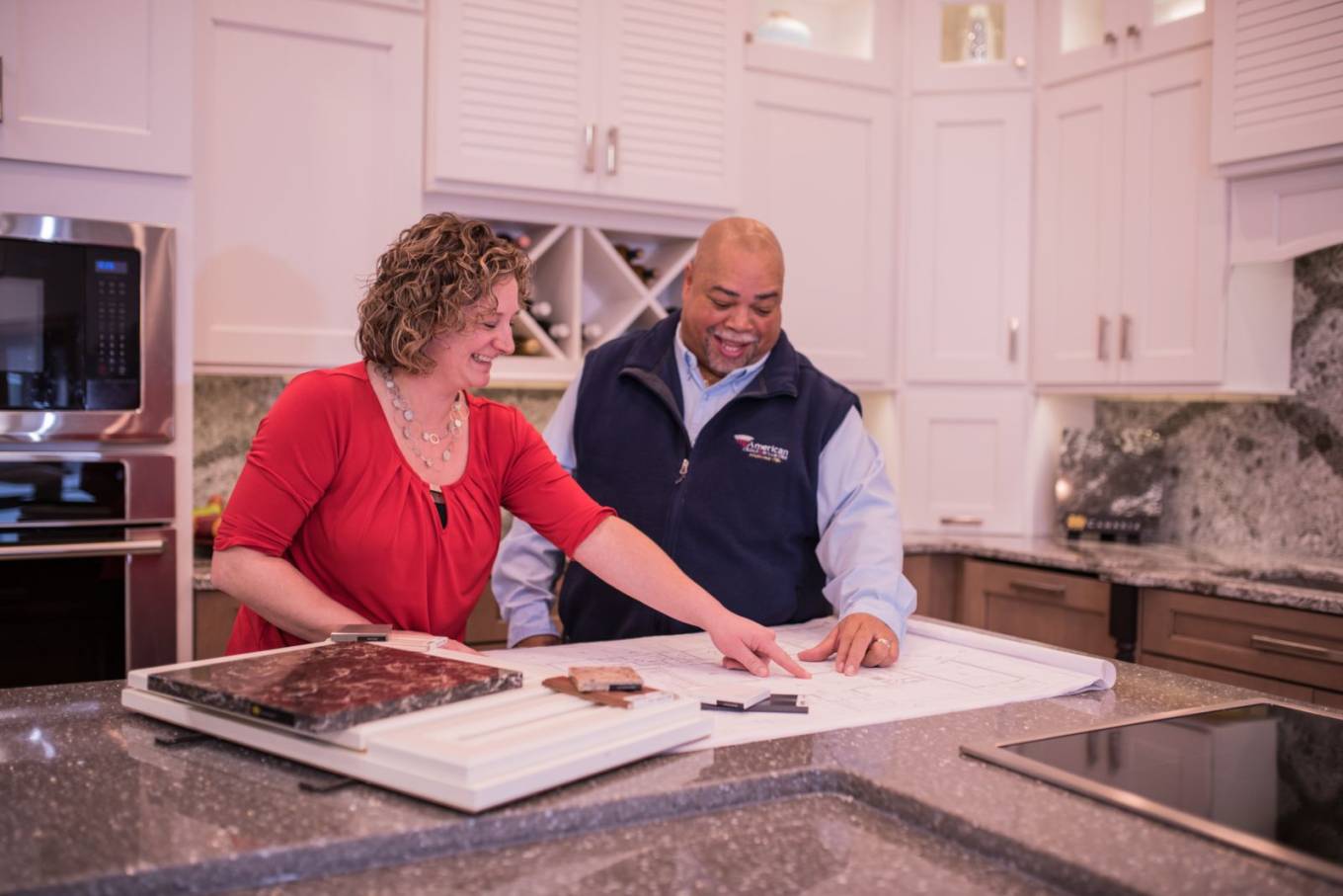 Reviewing kitchen design with American Cedar Designer