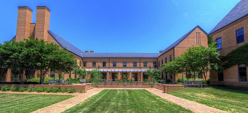Large brick building with a courtyard and lawn in Millersville, Baltimore, MD