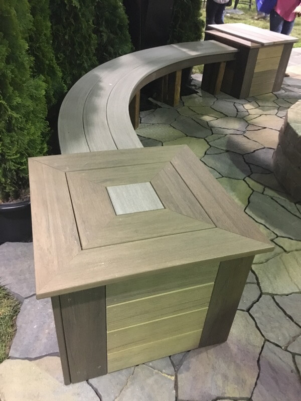 Outdoor bench and table with a fire pit, ideal for gatherings in Millersville and Baltimore, MD