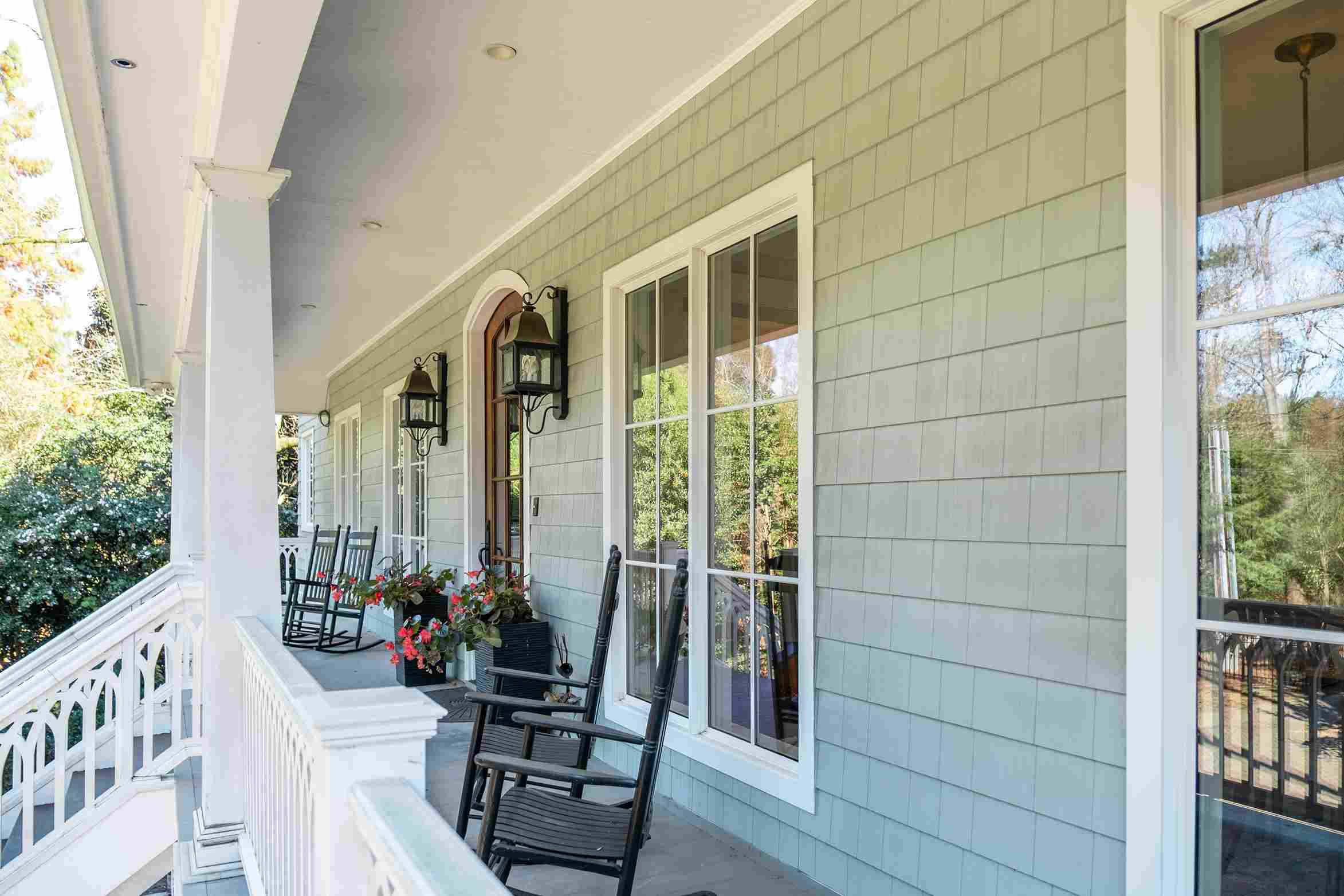 Cozy front porch with wooden chairs in Raleigh, NC