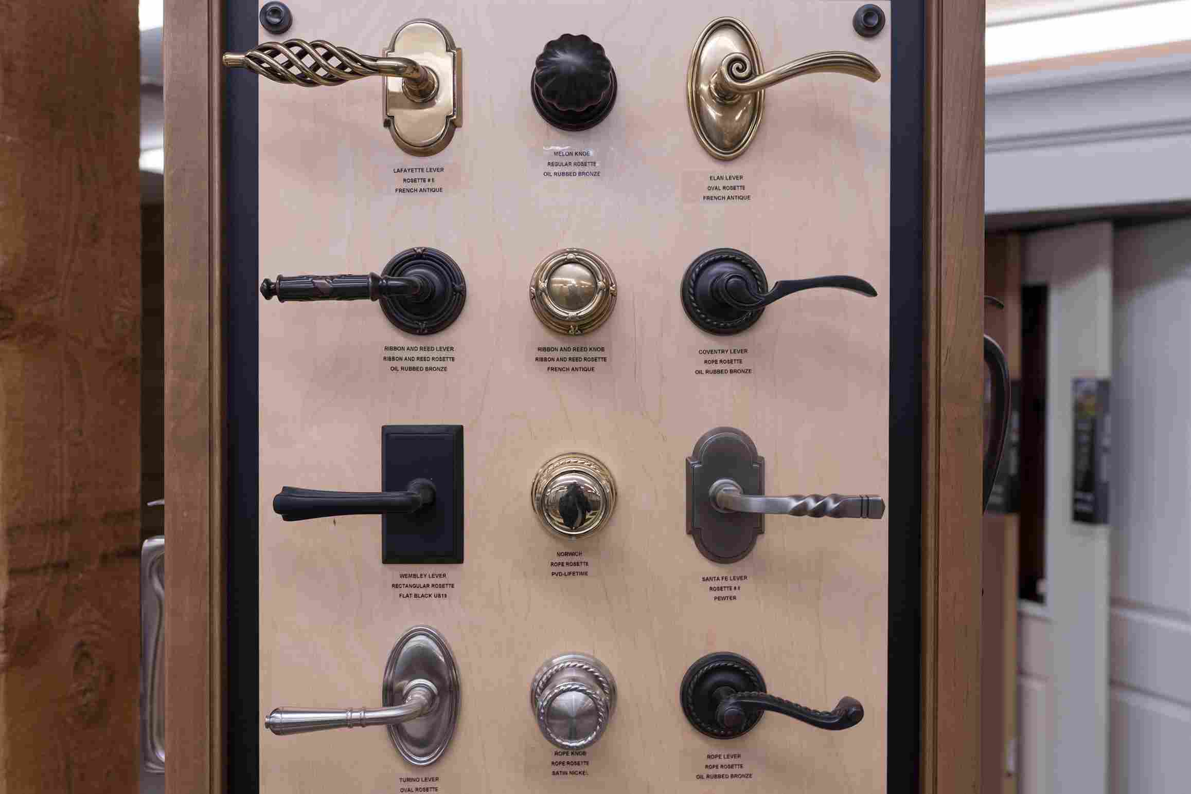 Collection of different door handles illustrating various designs and materials in Raleigh, NC